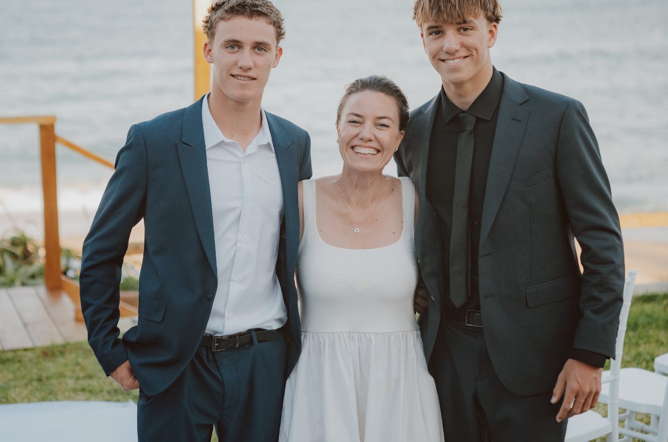 Tina Tower with her two sons by the ocean