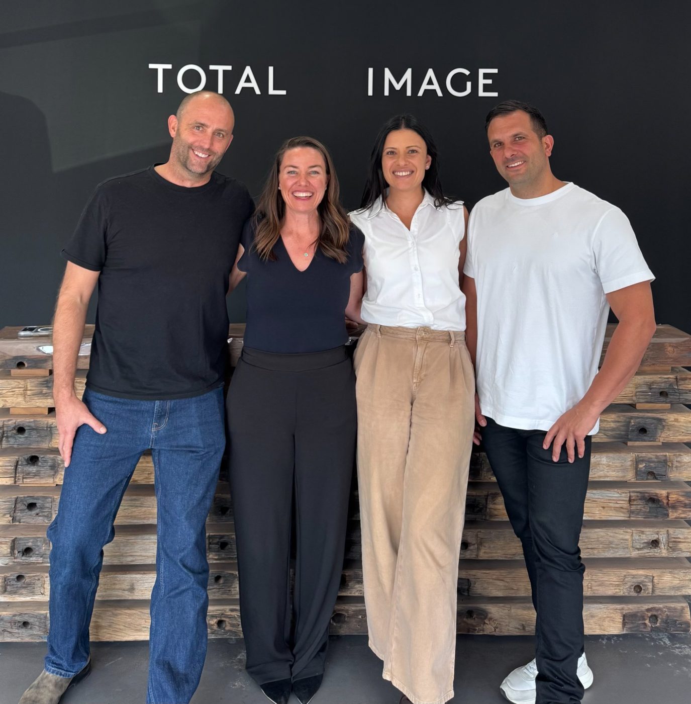 Tina with the Total Image Group team in their Marrickville office