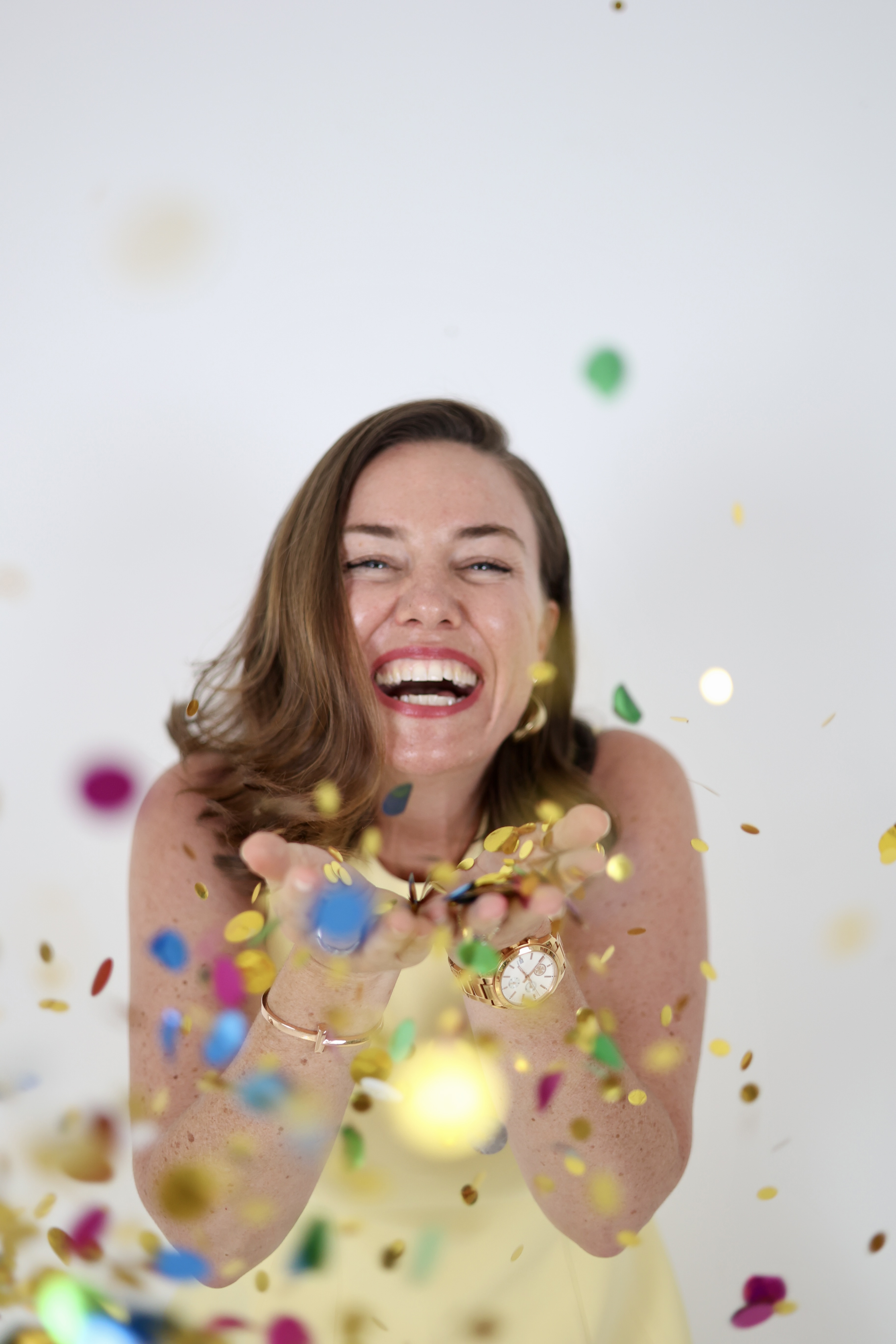 Tina Tower celebrating with confetti